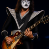 Ace Frehley performing live on stage in his iconic Spaceman KISS costume